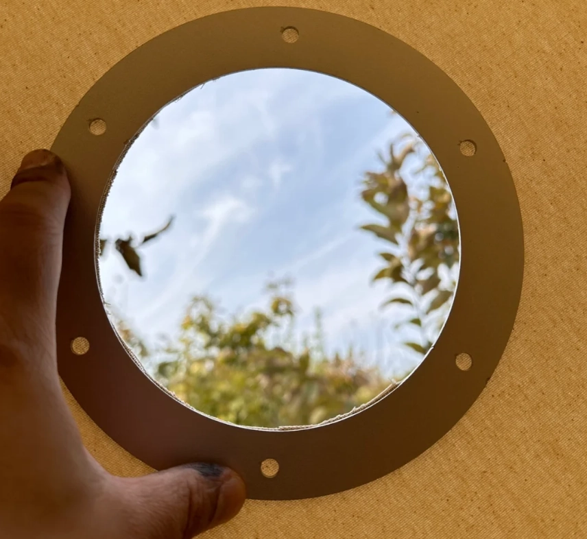 Hoe je een rookkanaal op een tentkachel van canvas installeert